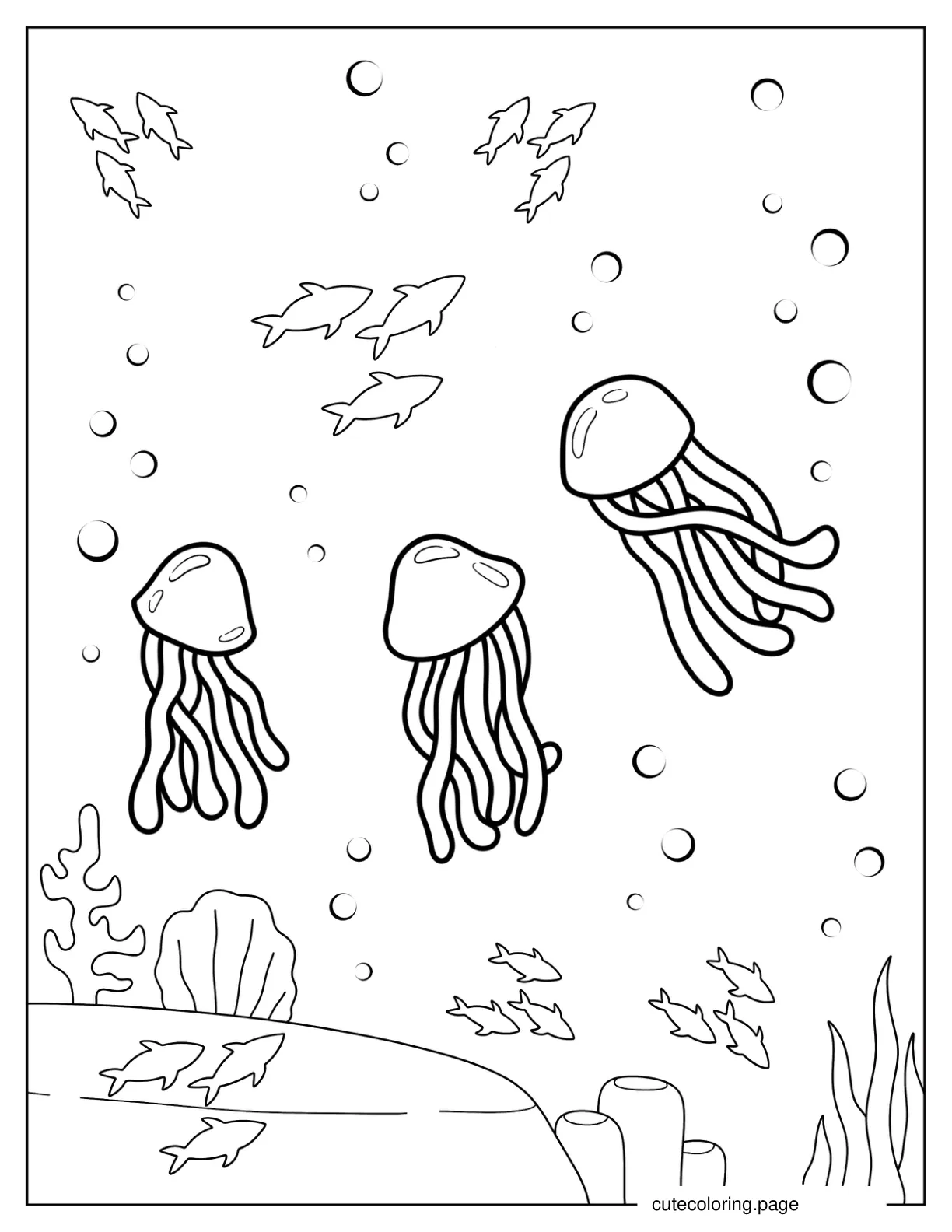 Three Jellyfish Swimming In Coral Reef coloring page